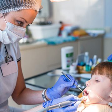 Bellevue Kids Dentist - Young child getting his teeth cleaned